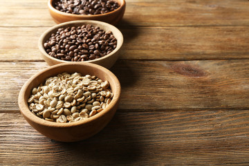 Coffee beans on wooden background