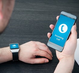Incoming call notification on smart watch connected to smart pho