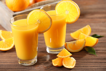 Obraz na płótnie Canvas Orange juice on table close-up