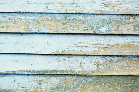 Old colorful wooden surface with cracks