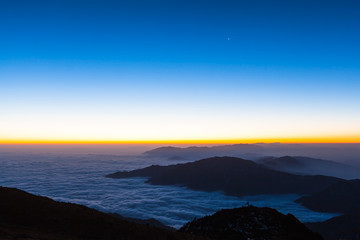 Sunrise on cattle back mountain