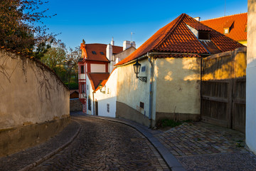 Old street of Hradcany in Prague at sunset. Czech Republic