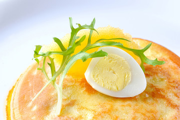 pancake with capelin roe and quail egg