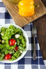 fresh vegetable salad in bowl on table close up