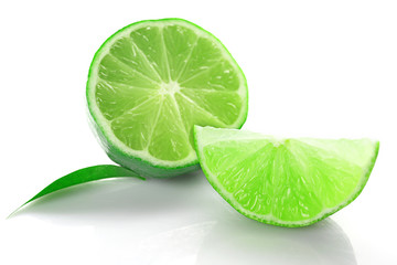 Sliced fresh limes isolated on white