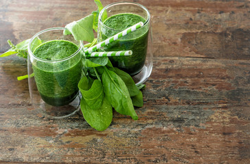 Fresh green spinach leaves and smoothie drink. Healthy food