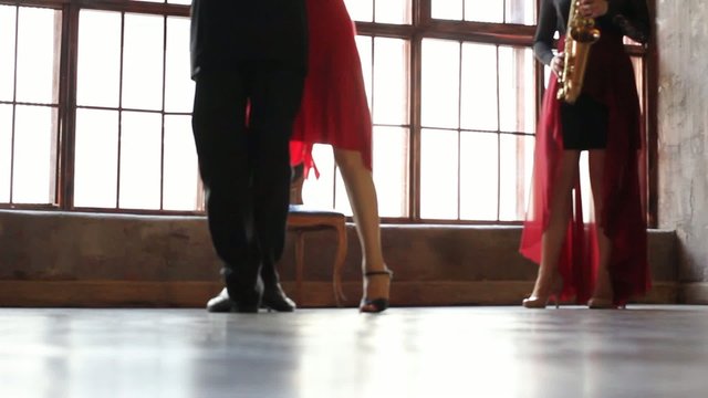 Tango dancers foot in vintage hall