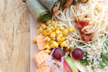 Pasta spaghetti with salad mix fruit and vegetables