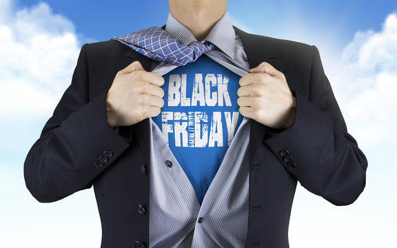 businessman showing Black Friday words underneath his shirt