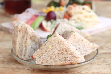 Club sandwich and pasta spaghetti with salad mix fruit