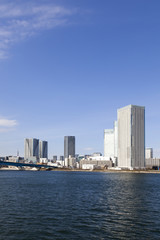 Fototapeta na wymiar 東京都市風景　豊洲から望む　晴海地区のタワーマンションと東京タワー