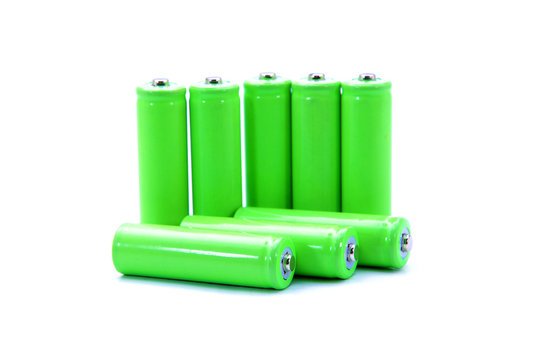 Green Cylinder Size AA Batteries Over White Background