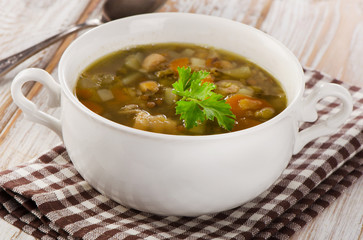 Bowl of Soup with Lentils, Beans, Chicken and Vegetables.