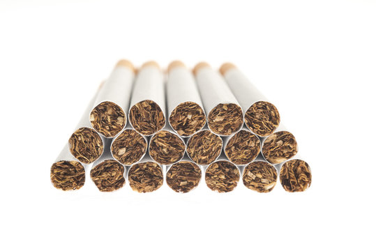 heap of cigarettes isolated on white