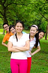 Group of asian adults in sports outfit