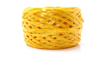 A Coil Of Yellow Plastic Rope