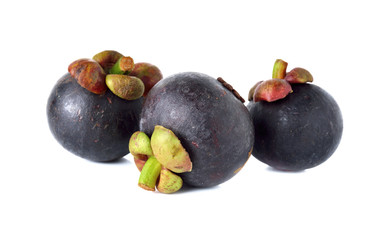 whole mangosteen with stem on white background