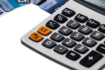 Credit card with calculator isolated on white background