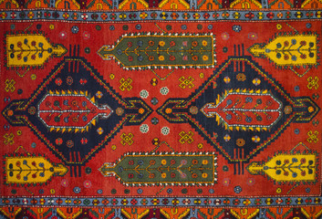 The middle red woolen carpet with geometric pattern