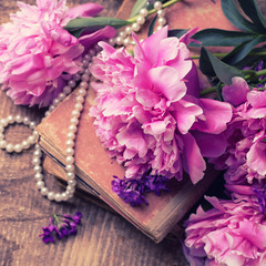 Vintage background with fresh peonies flowers