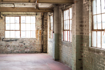 Empty warehouse office or commercial area, industrial background © andreaobzerova
