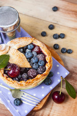Decorated homemade shortcrust pastry berry pie
