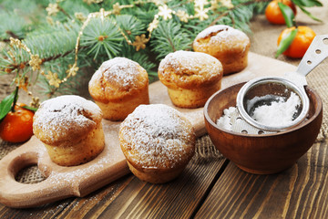 Obraz na płótnie Canvas Muffins with sugar powder