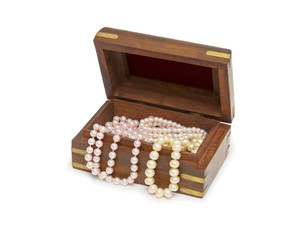 Small wooden chest with pearl necklace