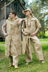Ancient Medieval couple in original costumes from gunny sacking
