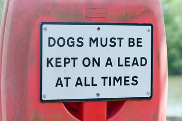 Dogs must be kept on a lead at all times sign