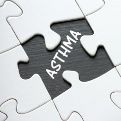 The word ASTHMA revealed by a missing jigsaw piece