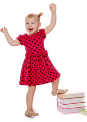 Joyful girl raised her hands up