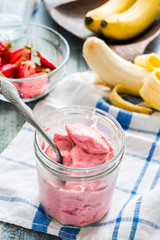 strawberry-banana smoothies in a glass, healthy dessert, summer