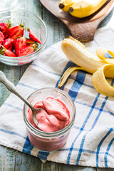 strawberry-banana ice cream in a glass, healthy dessert, summer