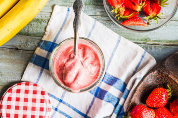 strawberry-banana ice cream in a glass fruit dessert, summer