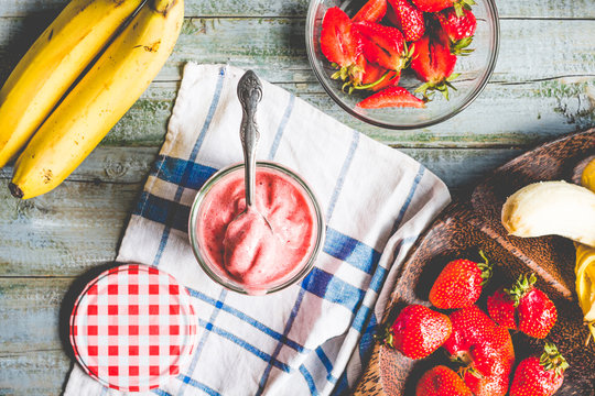 strawberry-banana ice cream in a glass fruit dessert, summer