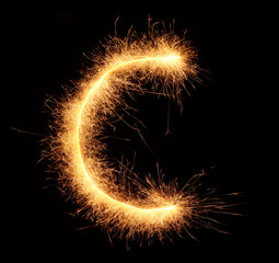 "C" letter drawn with bengali sparkles