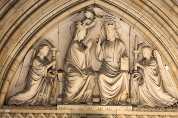 Fototapeta na wymiar Paris - Mary's coronation, Tympanum of the Sainte Chapelle, built in 1239, in Ile de la Cite