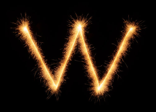 "W" letter drawn with bengali sparkles