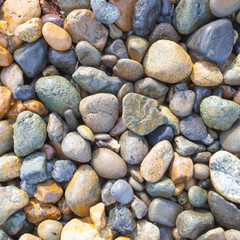 Close - up sea pebble stone background
