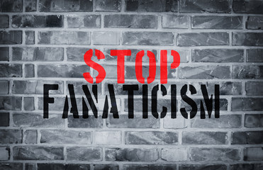 Stop Fanaticism stencil print on the grunge white brick wall - obrazy, fototapety, plakaty