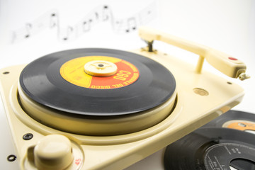 composition with vintage record player and records