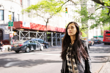 Young beautiful woman portrait in the street. New York City.