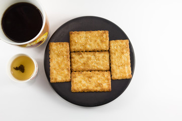 Salty Crackers With Coffee and Tea