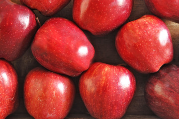 Fresh Red Apples on Wooden as Background Uses.