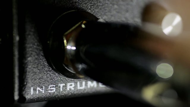 Plugging into Guitar Amplifier 