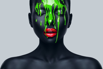 woman with flowing green paint