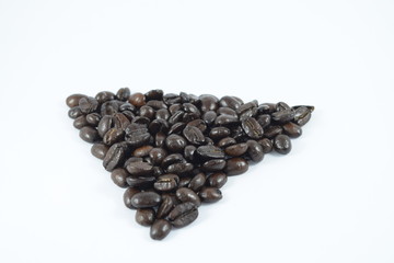 Roasted coffee beans on white background