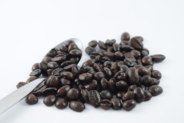 Roasted coffee beans on white background