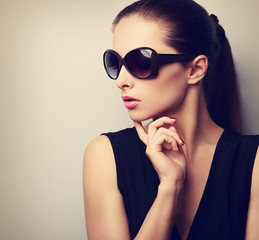 Chic beautiful young female model profile in fashion sunglasses
